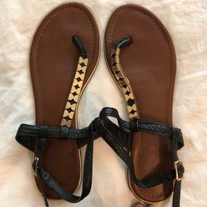 Black and gold sandals